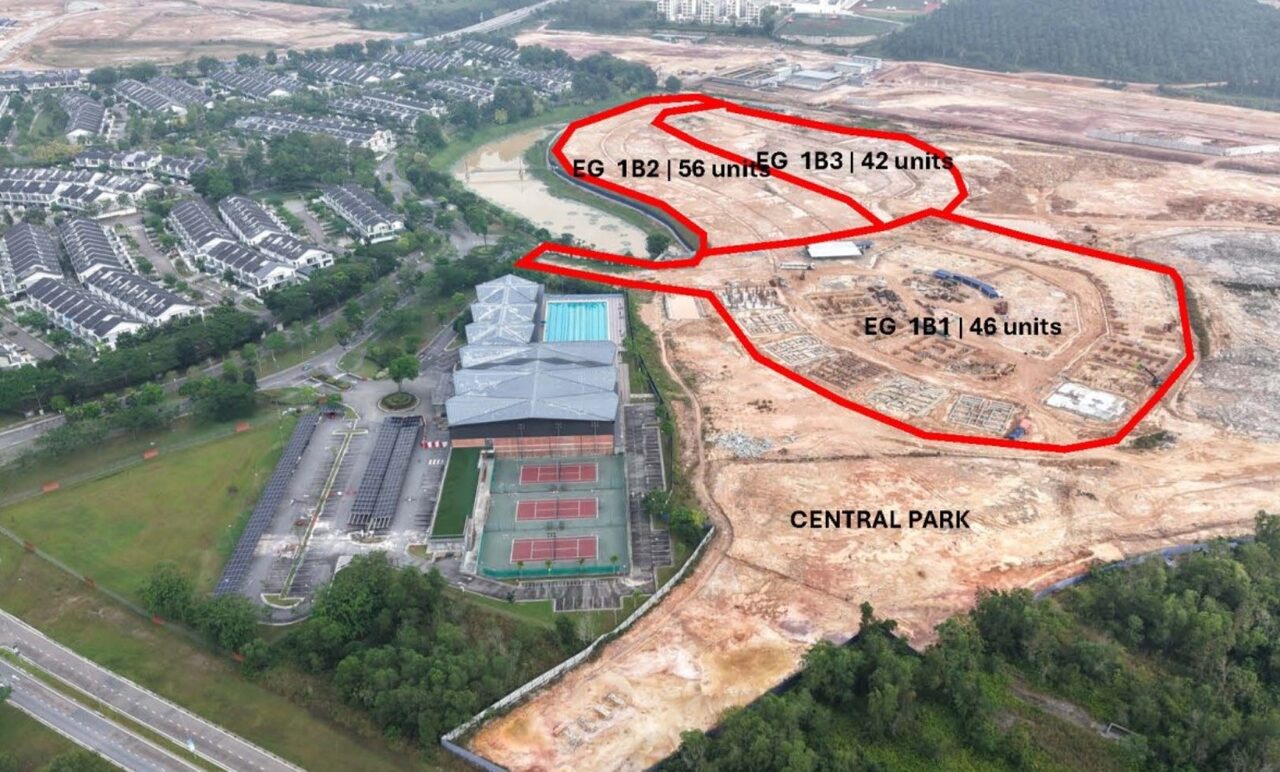 Aerial construction progress view of Estuari Greens phases and Central Park