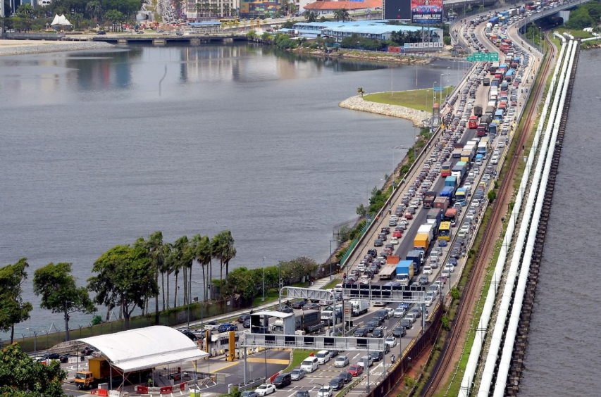 Cars, buses and lorries queuing on the Johor-Singapore Causeway