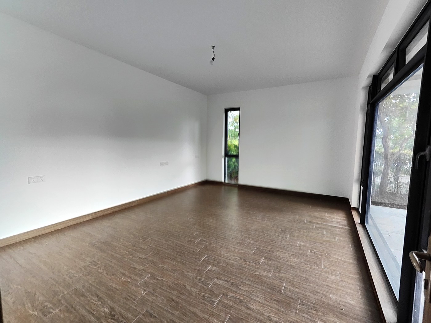 Second bedroom with floor-to-ceiling windows